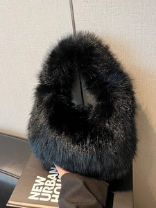 Fashionable black faux fur crescent tote bag for women with thick plush texture