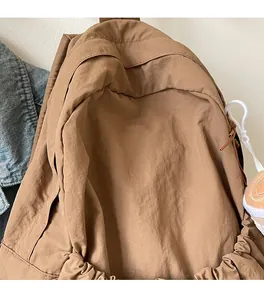 Close-up of the brown nylon fabric texture and soft material on the Japanese backpack