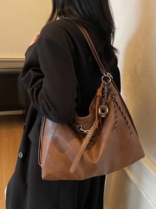 Large capacity brown PU leather tote bag with donut pendant and woven rope detail