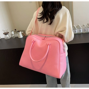 Pink large capacity travel tote bag with double zippers and stylish shoulder strap