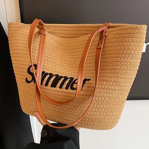 Women straw tote bag with Summer embroidery and brown leather handles for beach