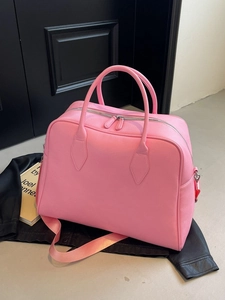 Pink large tote bag in pebbled leather with top handles and adjustable strap