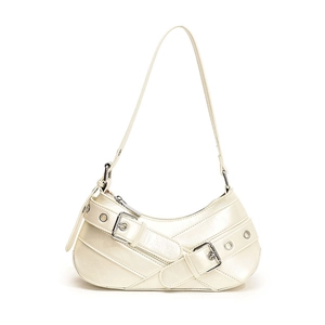 Chic cream crescent shoulder bag with crisscross straps and silver buckle detail