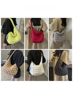 Collage of six colors of quilted puffer tote bags shown from a back view on models
