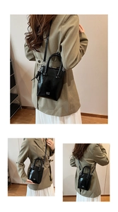 Fashionable black glossy bucket bag worn by model, showing versatile crossbody and handbag styles