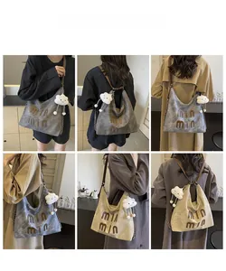 Detailed views of the spacious tote bag featuring long straps and a plush cloud charm