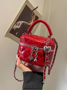Quilted red box handbag with silver chain strap and heart charm for women