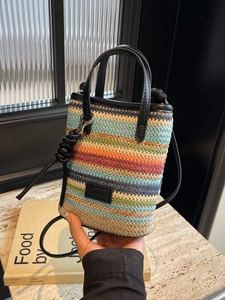 Bohemian colorful woven straw bucket bag with leather handles and crossbody strap