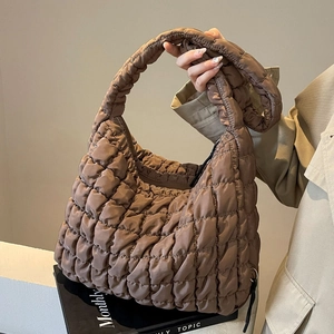 Brown quilted cloud shoulder bag with soft textured hobo design for women's casual style