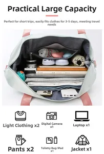 Detail view of spacious light green oxford travel bag with multiple interior pockets