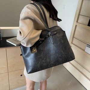 Retro black matte leather large tote bag with buckle detail for everyday commute use