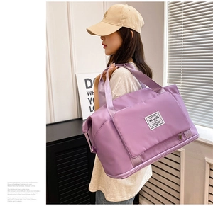 Waterproof purple oxford fabric travel bag featuring a separate bottom shoe compartment