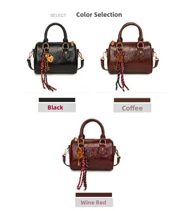 Detailed view of Boston bags in black, coffee, and wine red with heart locks and scarves