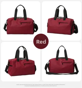 Detail view of red fitness bag with waterproof oxford fabric and reinforced nylon handles