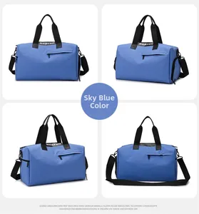 Detail view of the sky blue sports gym bag with thick handles and detachable shoulder strap