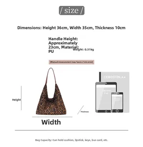 Size guide for leopard print tote bag with dimensions 36x35x10 cm and A4 paper comparison