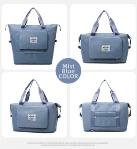 Detail of misty blue travel bag showing foldable expansion and luggage sleeve feature