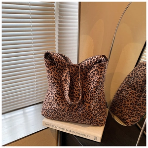 Detailed view of leopard print tote bag on a modern minimalist home decor background
