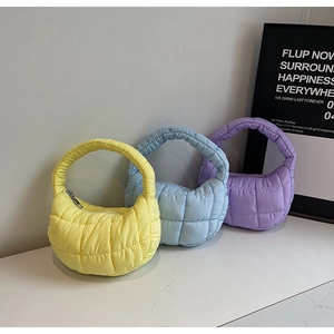 Quilted puffy cloud handbags in yellow blue and purple colors with ruched details