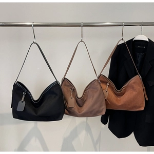 Hobo style large capacity shoulder bags in black, taupe and brown for autumn winter