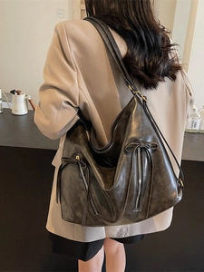 Retro large capacity dark brown hobo bag with oil-wax texture and bow detail