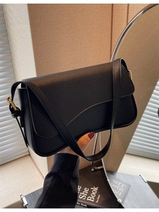Classic black leather shoulder bag with gold hardware and elegant retro French style