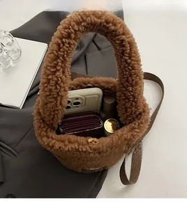 Interior view of brown plush bucket bag showing spacious capacity for daily essentials