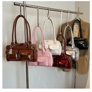 Y2K style shiny patent leather underarm bags in multiple colors with heart charms