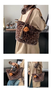 Detail of plush leopard print tote bag featuring soft faux fur texture and dog charm