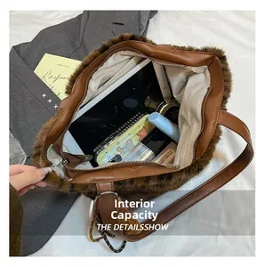 Internal capacity of the leopard print plush tote bag showing storage for daily items
