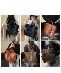 Sac à dos vintage en cuir noir et marron présenté par des modèles en plusieurs coloris