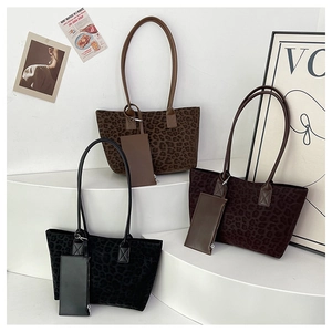 Three leopard print suede tote bags in black, dark coffee and brown with matching pouches