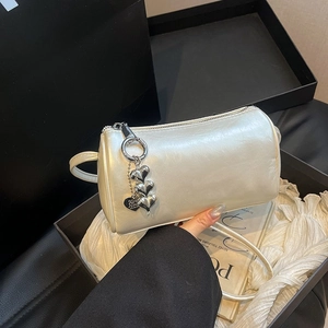 Elegant pearl white cylindrical crossbody bag with silver heart charm for women