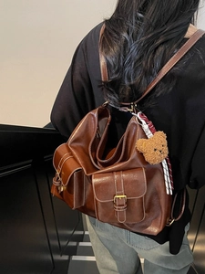 Retro brown multi-pocket convertible tote backpack for women with plush bear charm