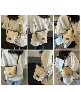 Multiple views of a straw bucket bag with dark brown leather straps for summer vacations