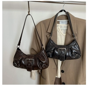 Retro Y2K hobo shoulder bags in brown and black leather with vintage buckles