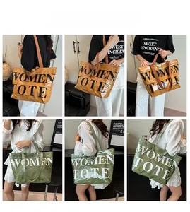 Dettagli della borsa tote grande in marrone e verde con scritta Women Tote stampata
