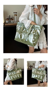 Dettaglio della borsa tote verde oliva con trama stropicciata e testo WOMEN TOTE bianco