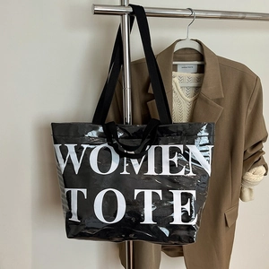 Borsa tote minimalista bianca e nera con scritta WOMEN TOTE e doppi manici a mano
