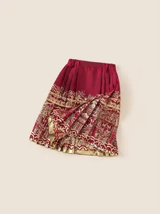 Traditional dark red girls Mamian skirt with intricate golden floral patterns and silk finish