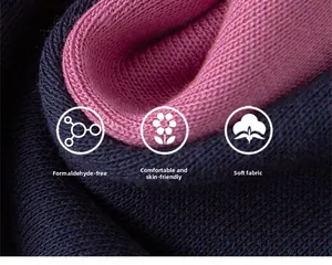 Macro detail of navy and pink double-knit fabric, formaldehyde-free and skin-friendly texture