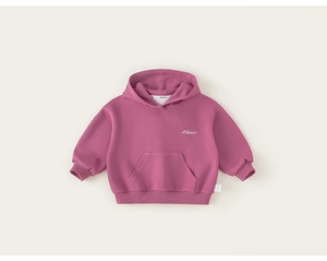 Close-up of purple hooded sweatshirt featuring white letter embroidery and kangaroo pocket