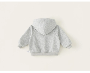Detailed macro view of gray cotton hoodie ribbed cuffs and soft fabric texture