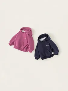 Kids oversized hoodies in plum and navy blue featuring kangaroo pockets and embroidery