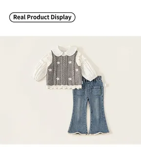 Detail of girl's white shirt, floral knit vest and flared jeans with scalloped hems