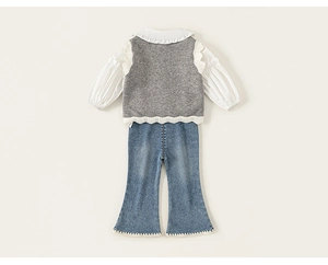 Back view of girls' three-piece set with ruffled shirt, knit vest, and flare jeans