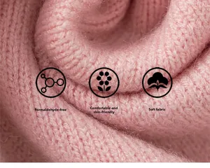Detail of pink knitted vest fabric showing soft texture and formaldehyde-free quality