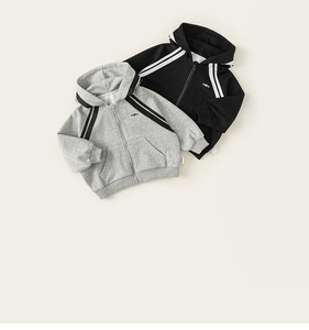 Detail view of cotton hoodies for boys with double stripes on shoulders and rib cuffs