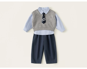 Detail of kids preppy style set featuring light blue striped shirt and grey knit vest