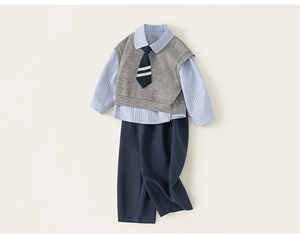 Detail of kids formal suit set with striped shirt, grey vest, and navy pants for events